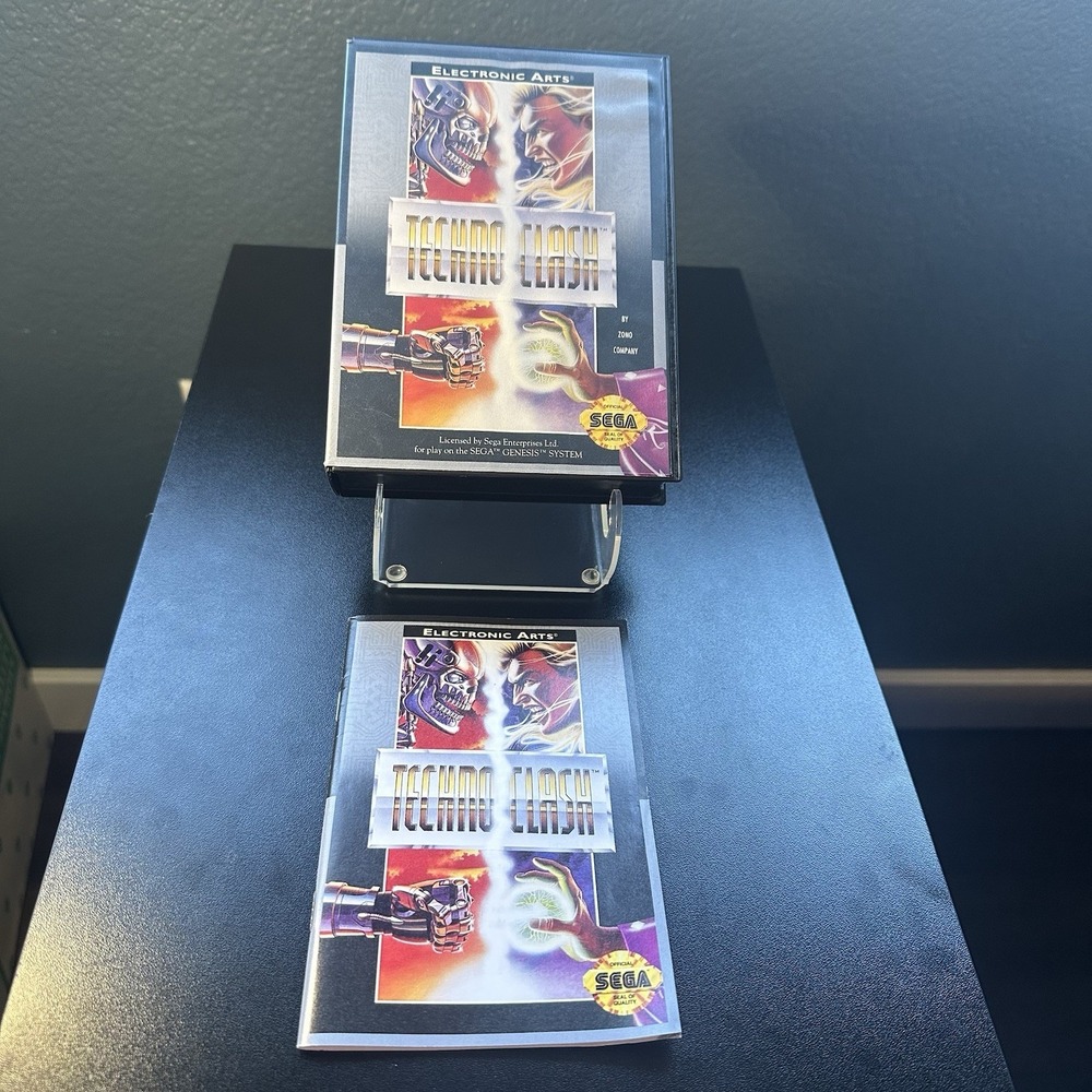 Techno Clash (Sega Genesis ) Authentic Case + Manual (No Game) Exc. Condition